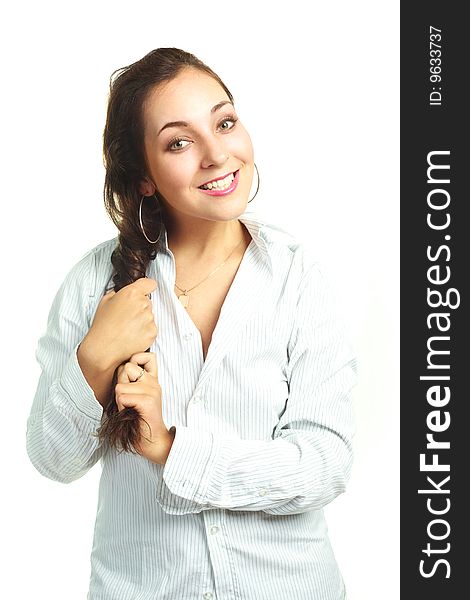 Portrait of young brunette woman wearing a white shirt. Portrait of young brunette woman wearing a white shirt