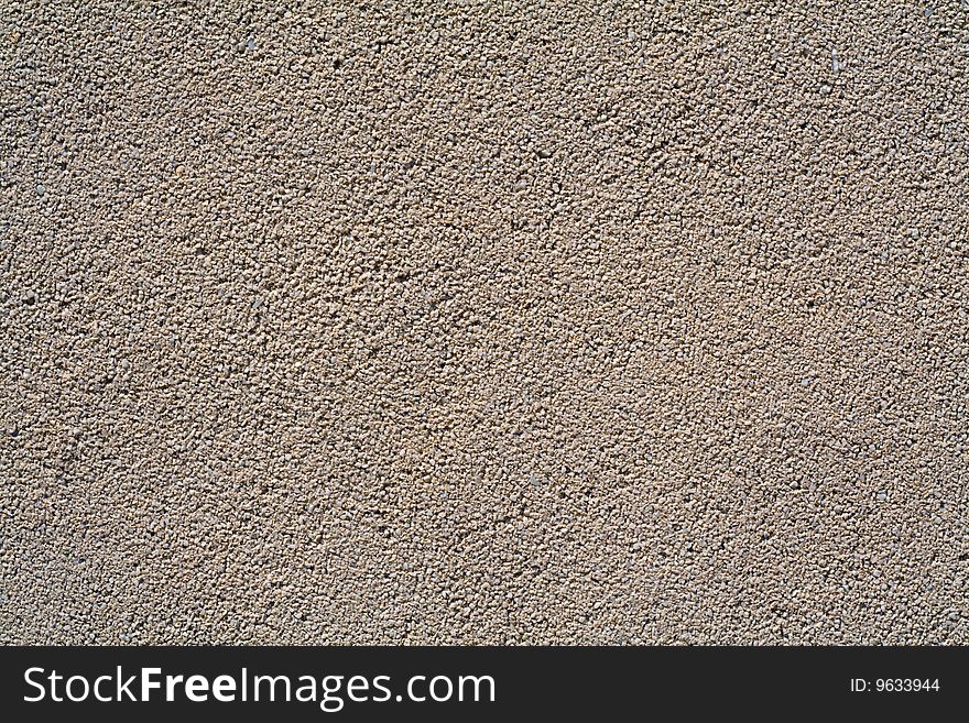 Concrete wall under a stone crumb. Concrete wall under a stone crumb