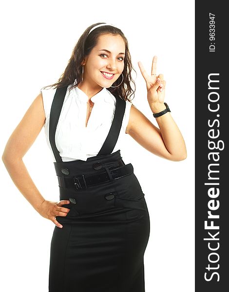 Pretty young brunette businesswoman showing us the Victory sign