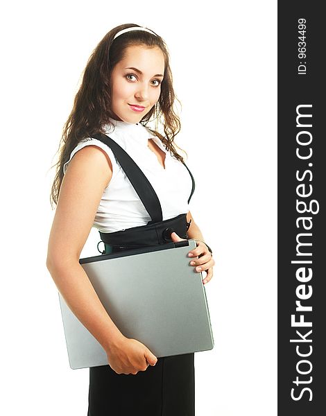 Portrait of a beautiful young brunette woman with a laptop. Portrait of a beautiful young brunette woman with a laptop