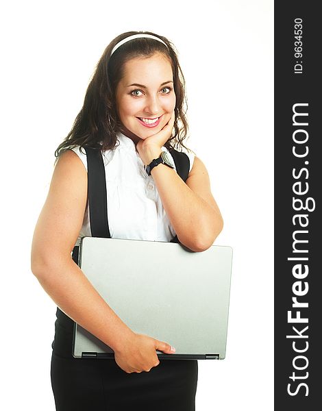Portrait of a beautiful young brunette woman with a laptop. Portrait of a beautiful young brunette woman with a laptop