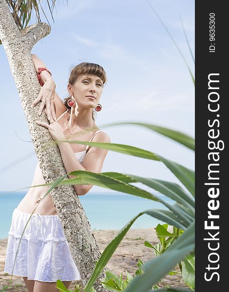 Portrait of beautiful girl having good time on tropical beach. Portrait of beautiful girl having good time on tropical beach