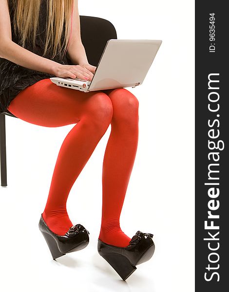 Woman S Legs In Red Stockings And Laptop