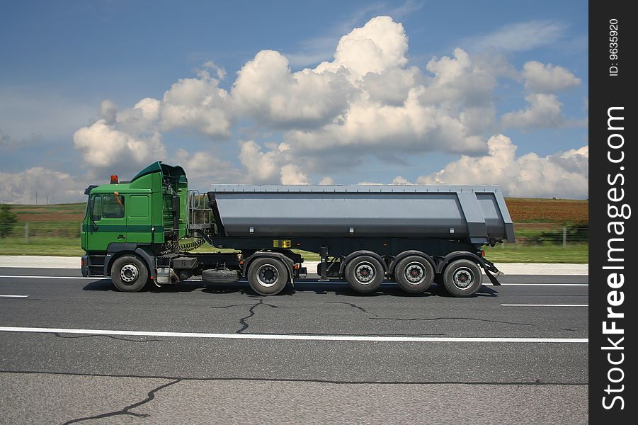 Empty lorry on the road.