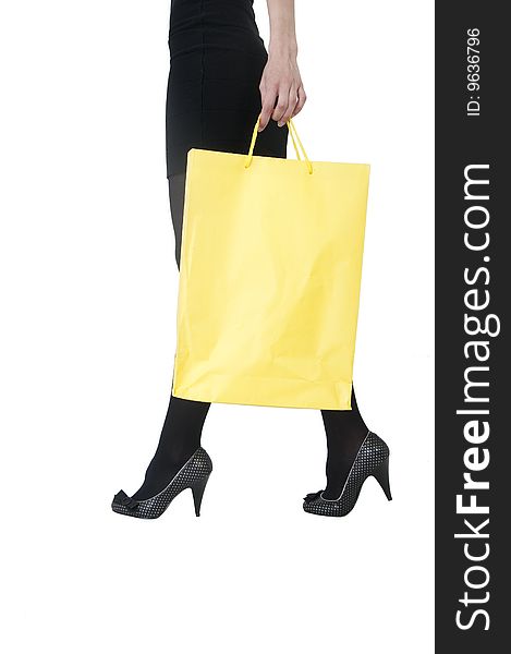Girl holding a yellow bag