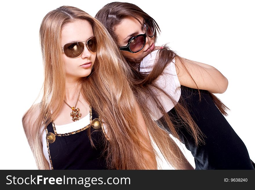 Two beautiful women in a suit on a white background isolated