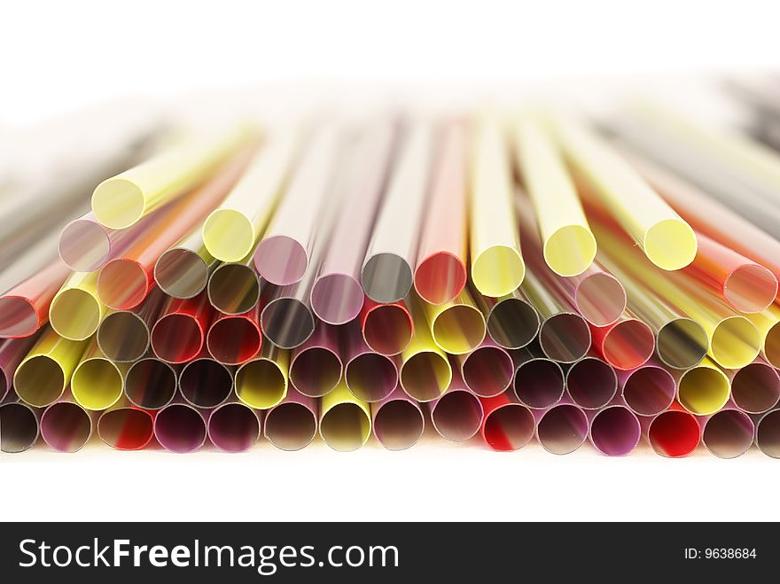 Closeup of drinking straws isolated on white background
