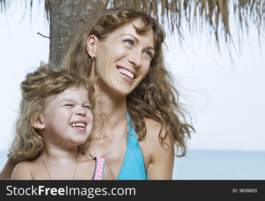 Portrait of beautiful young woman with her daughter. Portrait of beautiful young woman with her daughter