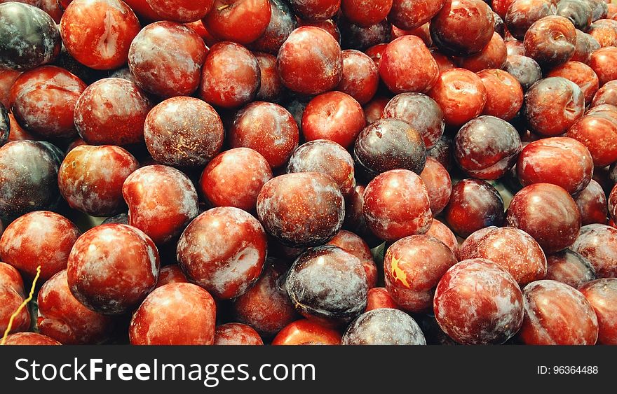 Piled of Red Plums