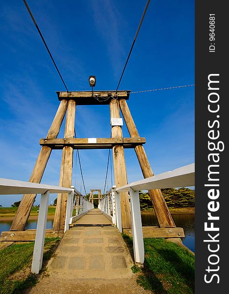 Wooden pedestrian bridge across Erskine river in Australia