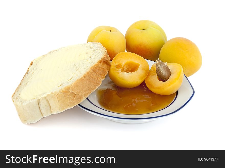 Apricots, apricot jam for breakfast, isolated against white background