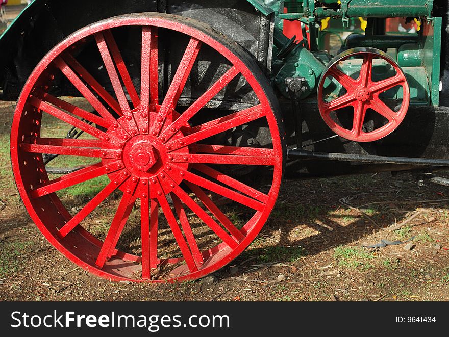 This road roller is lying in the park is well maintained. This road roller is lying in the park is well maintained