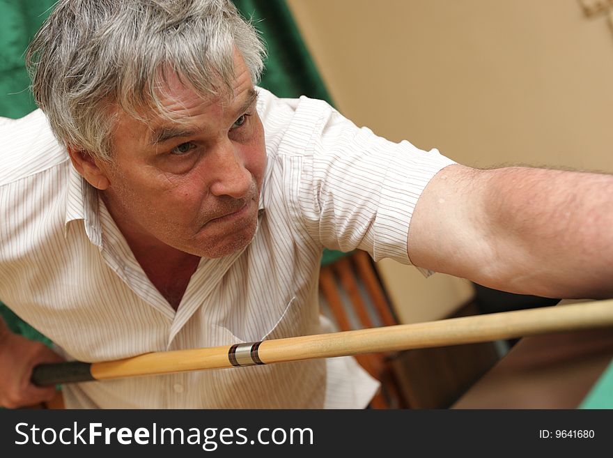 Portrait of a man with a cue. Portrait of a man with a cue