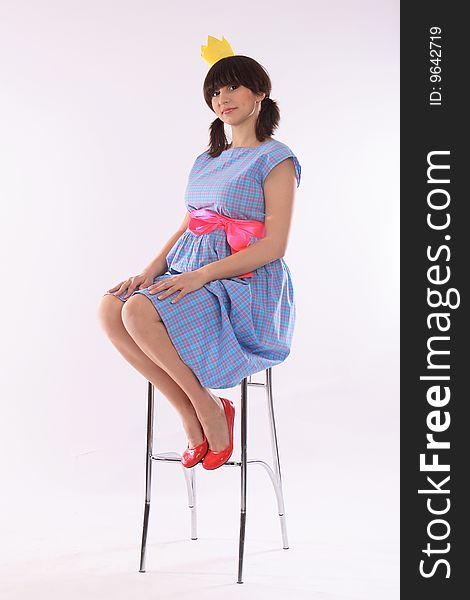 Pregnant Young Women sitting on a chair. Pregnant Young Women sitting on a chair