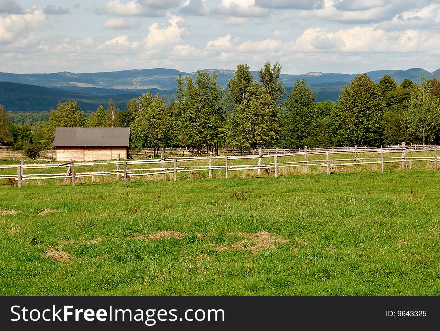 Small old hut stands on the meadow. Small old hut stands on the meadow