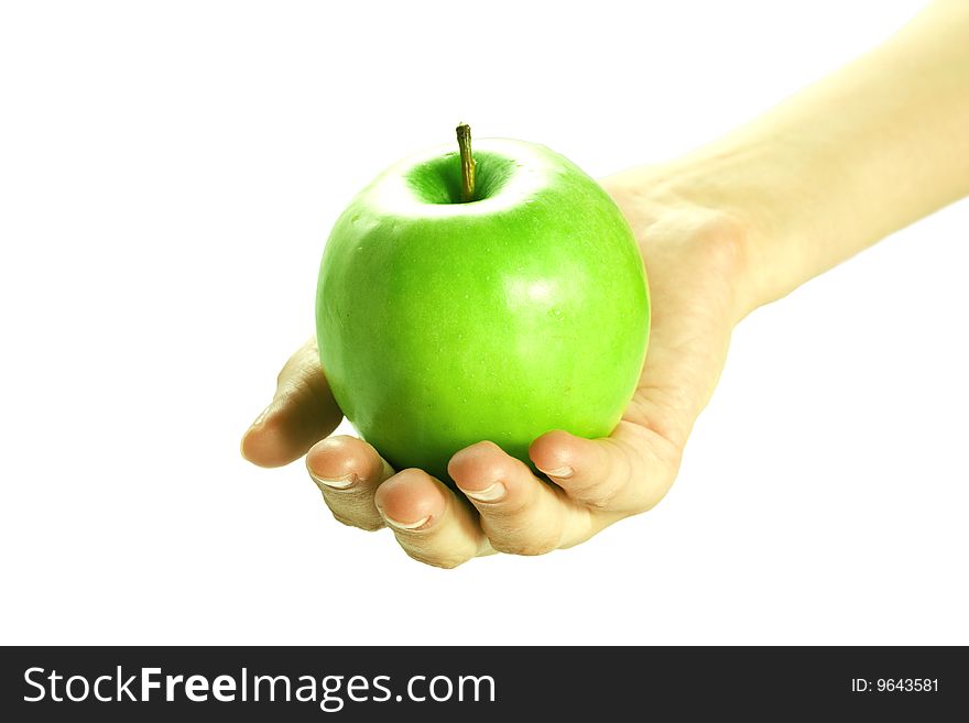 Apple in woman's hand on white