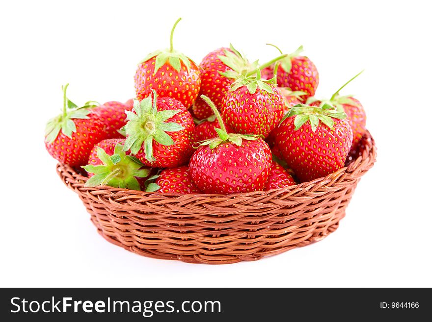 Fresh srawberries in basket isolated on white. Fresh srawberries in basket isolated on white