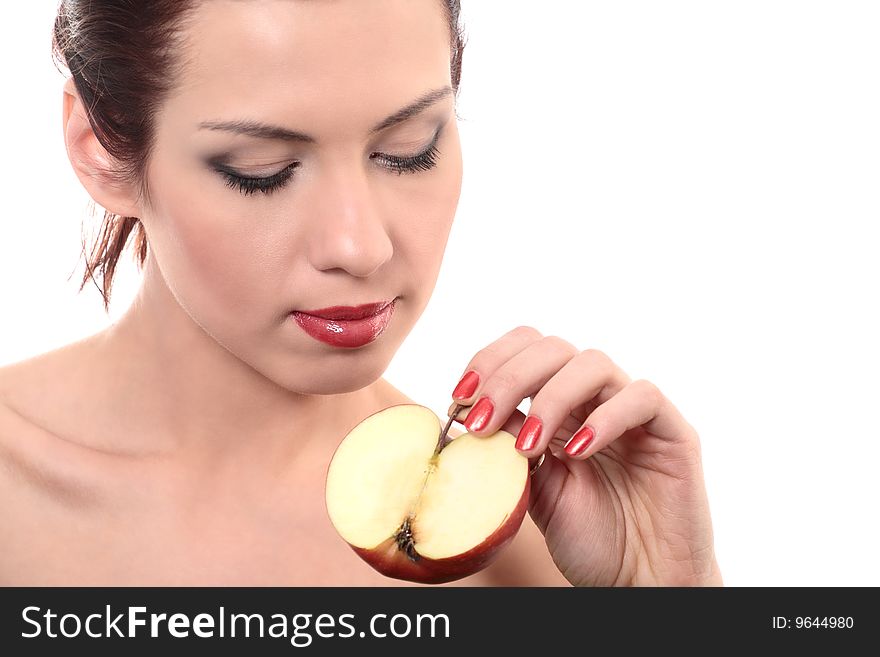 Close-up portrait of young beautiful healthy woman with half of red apple isolated on white. Close-up portrait of young beautiful healthy woman with half of red apple isolated on white