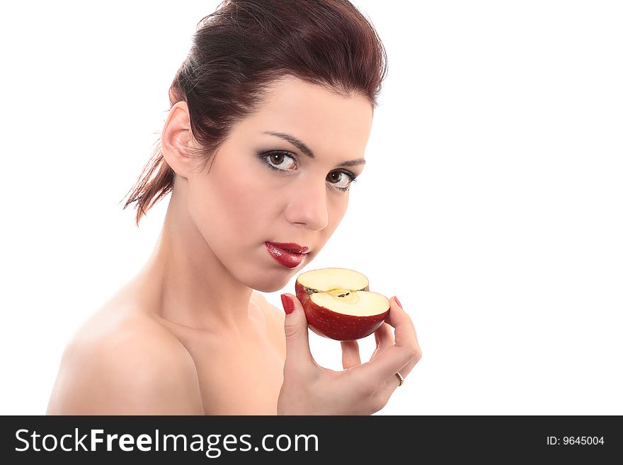 Close-up portrait of young beautiful healthy woman with half of red apple isolated on white. Close-up portrait of young beautiful healthy woman with half of red apple isolated on white