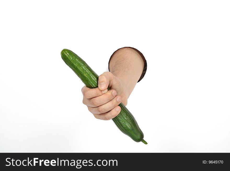 Long green cucumber in hand