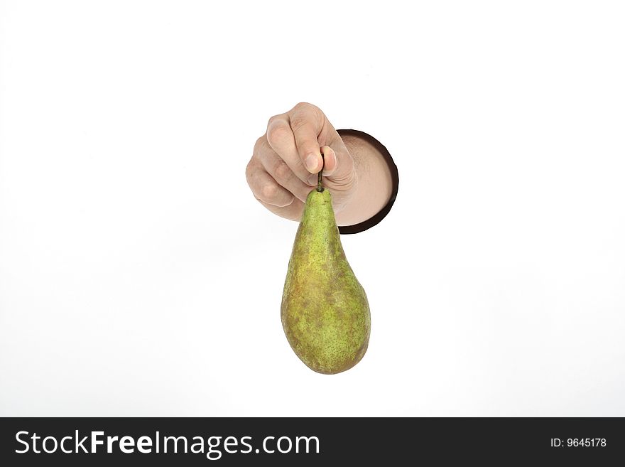 Big green pear in hand