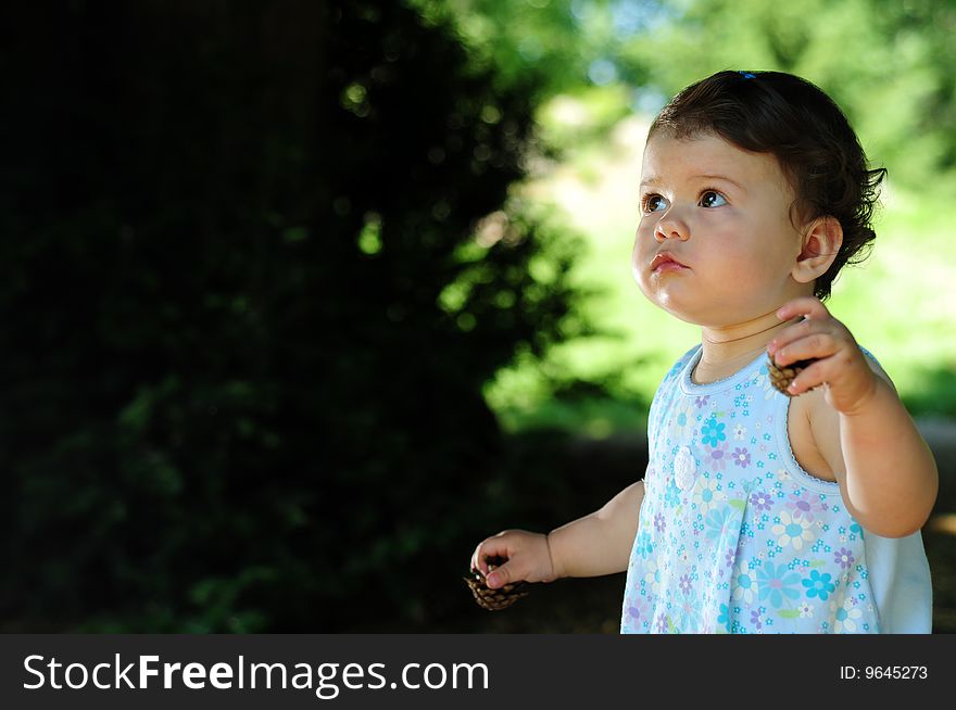 Baby girl in park