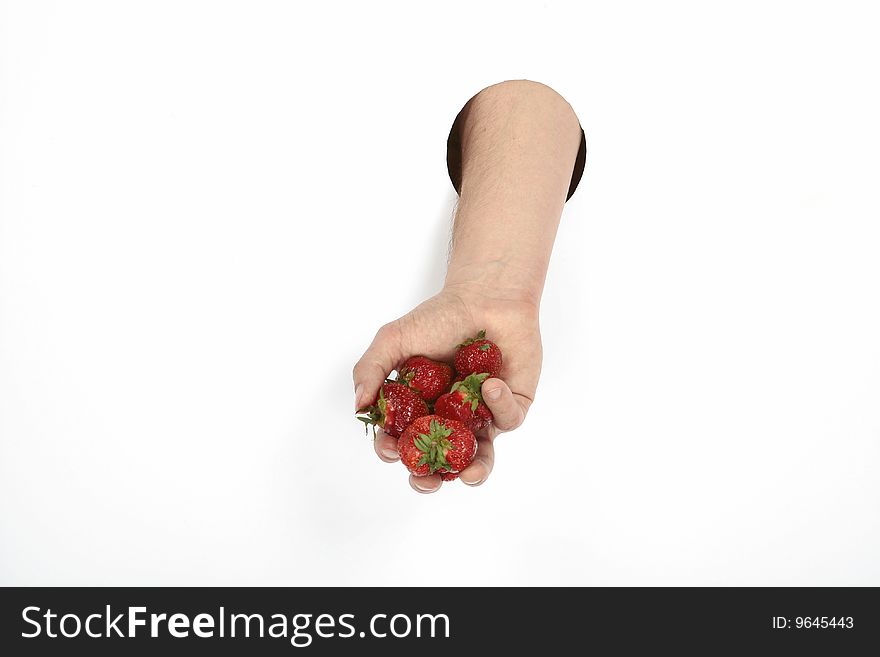 Sweet strawberry in man's hand