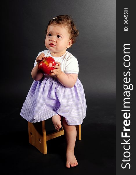 Baby Girl With Apple
