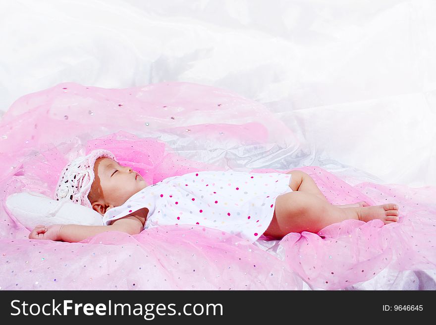 Cute baby sleeping with a monkey. Cute baby sleeping with a monkey