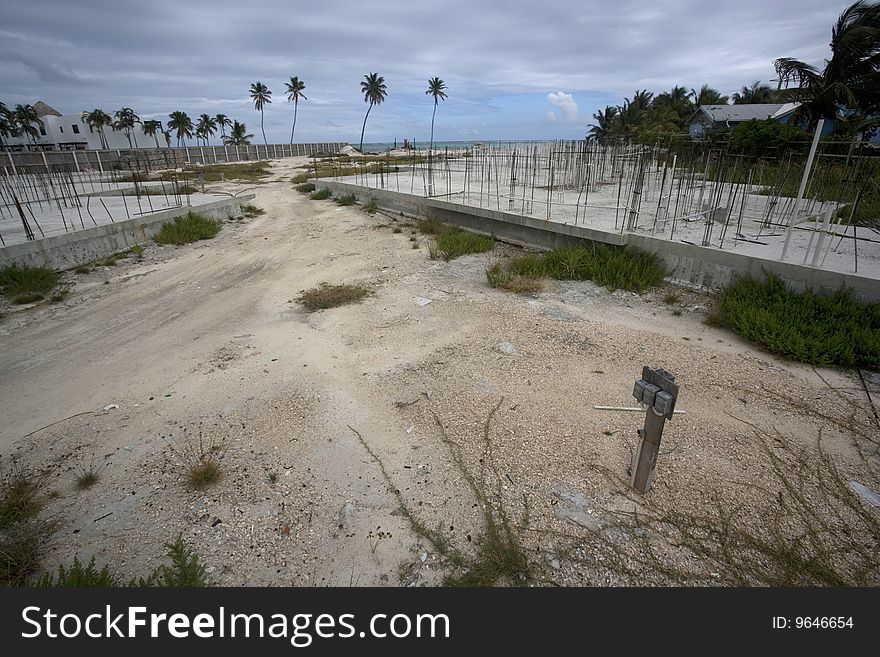 An abandoned construction site sits at the water's edge in the Gulf of Mexico.