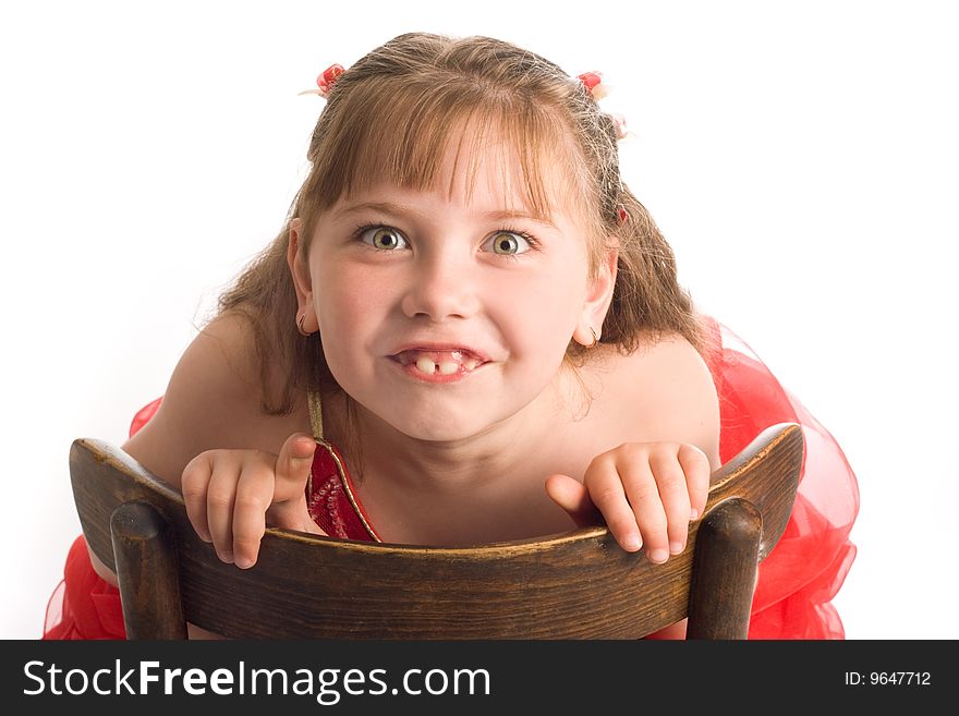 An image of nice girl on a brown chair. An image of nice girl on a brown chair