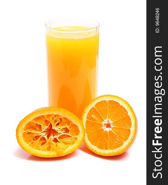 Orange and juice in glass isolated on white background
