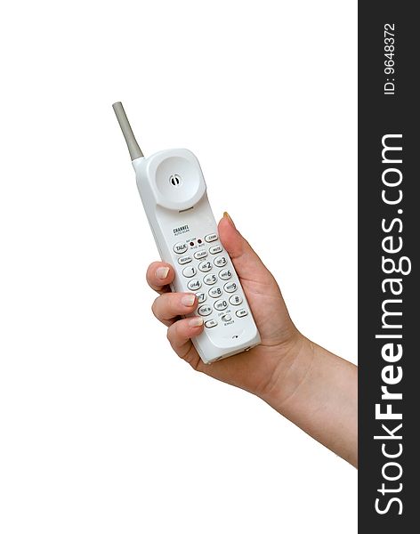 Close up of hand with cordless telephone