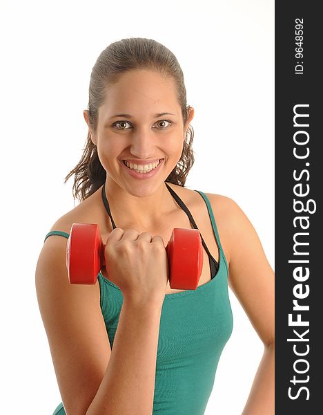 Young woman exercising with red dumbbell, wearing sporting outfit. Young woman exercising with red dumbbell, wearing sporting outfit.