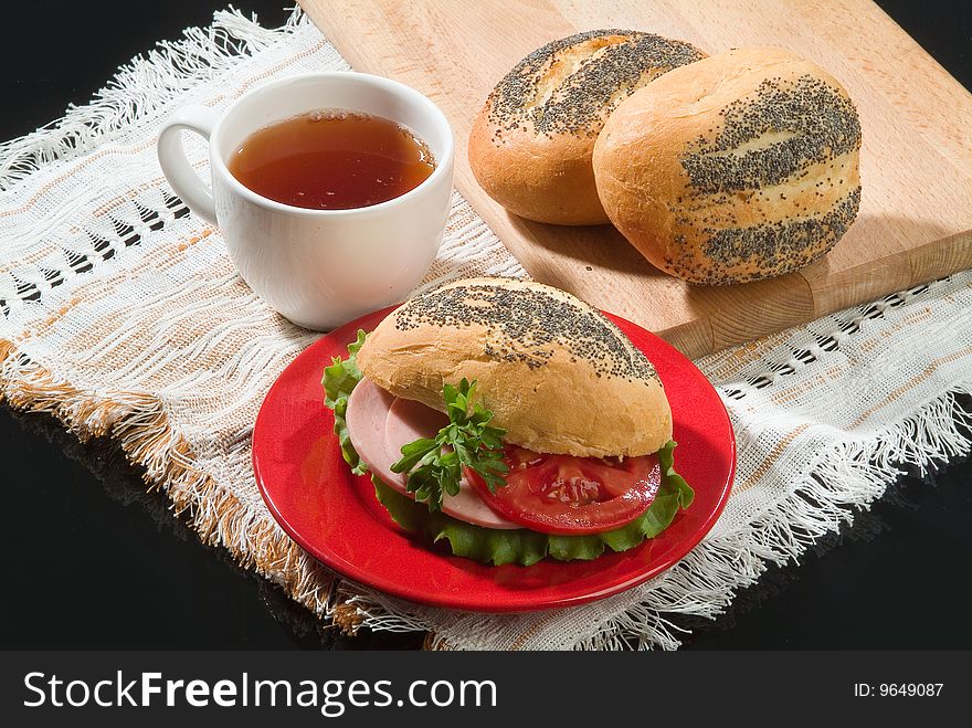 Bread and pastry with a cup of tea