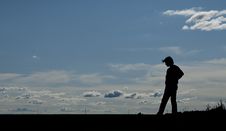 Silhouette Of A Young Man Stock Photography
