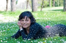 Smiling Girl Lying On A Flowery Meadow Royalty Free Stock Photos Smiling Girl Lying On A Flowery Meadow Royalty Free Stock Photos