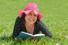 Smiling Girl Lying On A Meadow Reads A Book Royalty Free Stock Photo Smiling Girl Lying On A Meadow Reads A Book Royalty Free Stock Photo