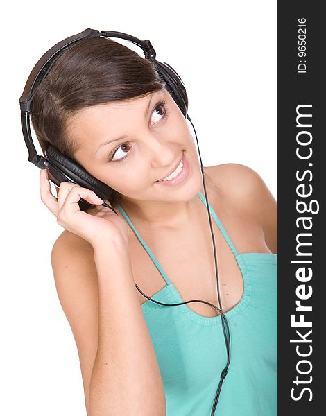 Pretty teen with headphones. over white background. Pretty teen with headphones. over white background