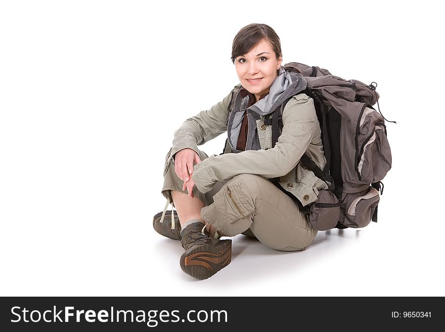 Happy brunette woman ready to travel. over white background. Happy brunette woman ready to travel. over white background