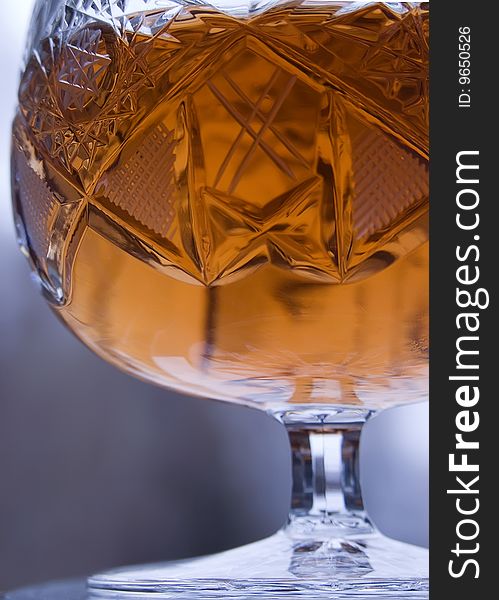 Snifter glass of cognacs( close-up).