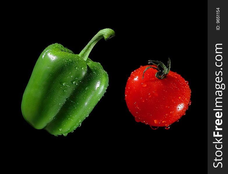 Green pepper and red tomato