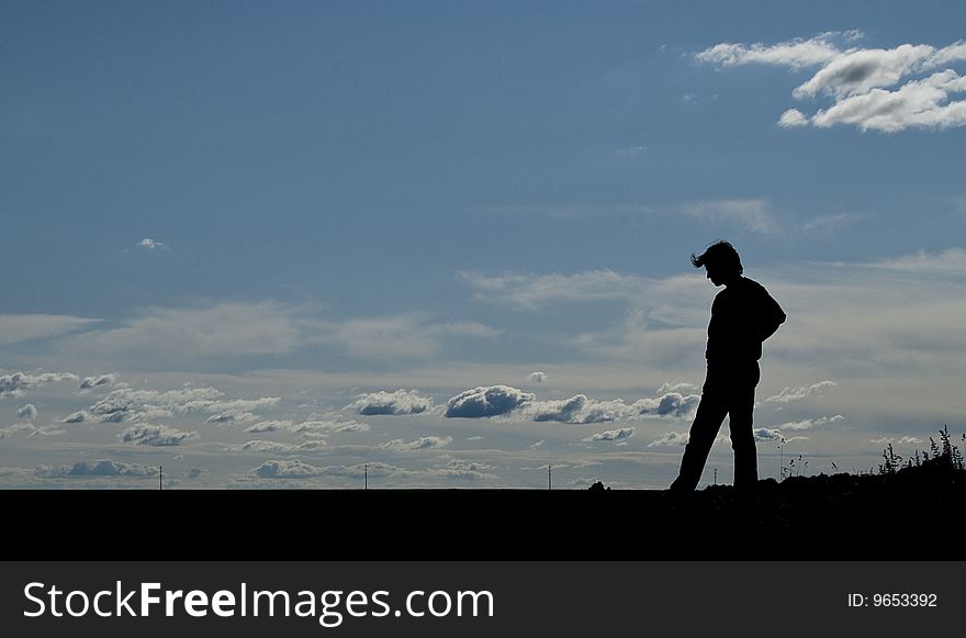 Silhouette of a young man