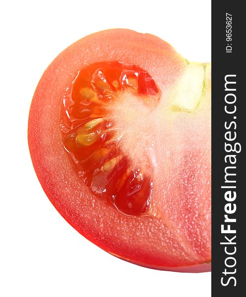 Tomato cut close-up isolated on white beckground. Tomato cut close-up isolated on white beckground