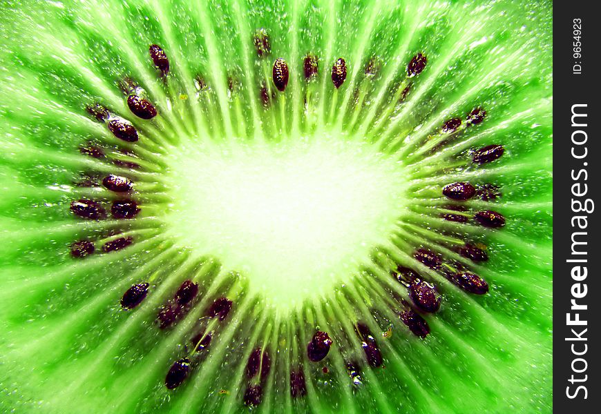 Photo green and fresh cut kiwi