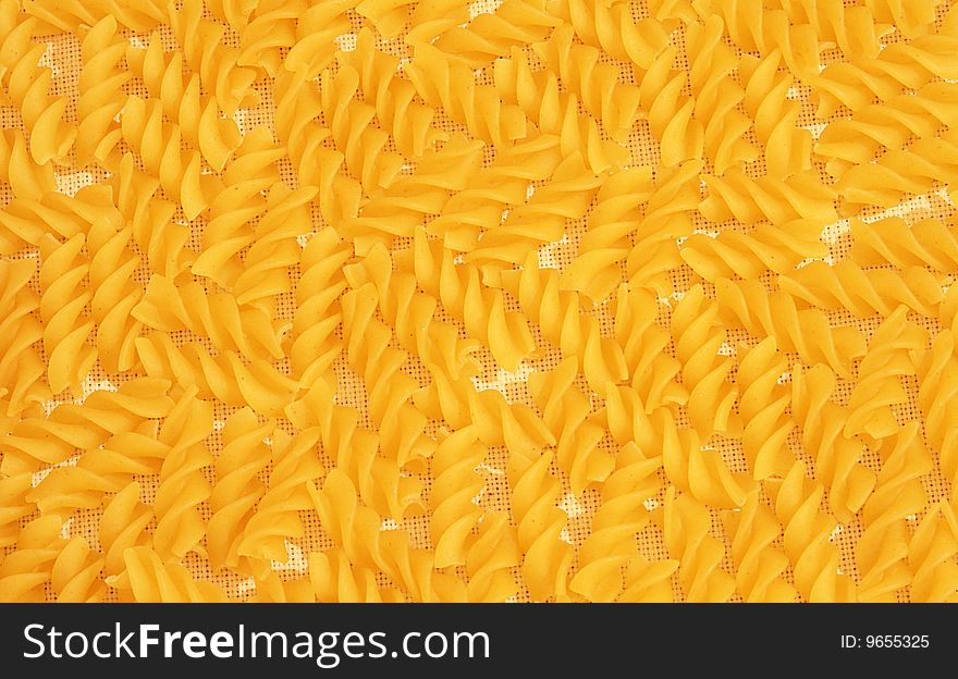 Yellow colorful texture from pasta. Yellow colorful texture from pasta