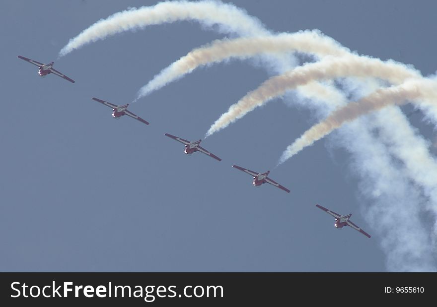 Aerial acrobatic team in formation with smoke. Aerial acrobatic team in formation with smoke