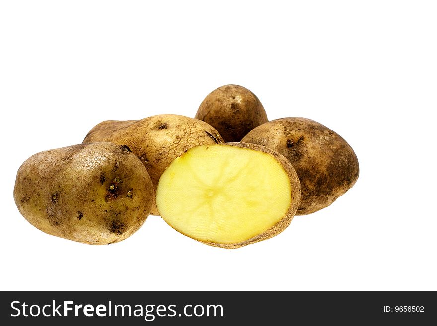 Tubers raw potatoes on a white background. Tubers raw potatoes on a white background