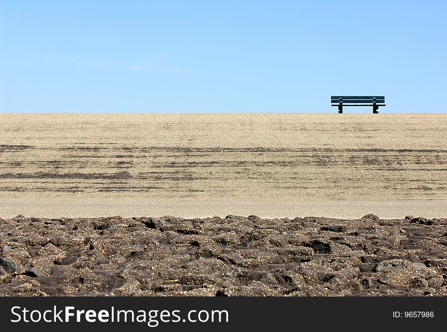 Lonely Bench On A Dike