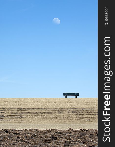 Lonely bench on a stone under the moonlight. Lonely bench on a stone under the moonlight